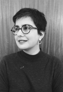 Black and white headshot of Kyveli